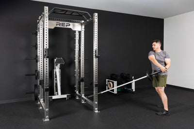 An athlete using the Kleva Adroit attached to the PR-5000 rack for a core workout