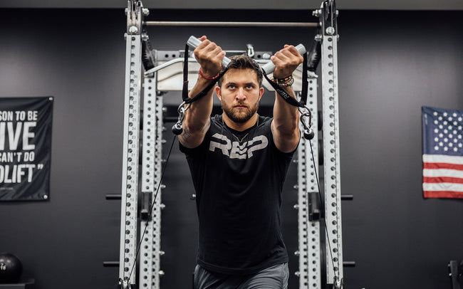 Ares Cable Attachment Being Used With D-handles For Front Raises